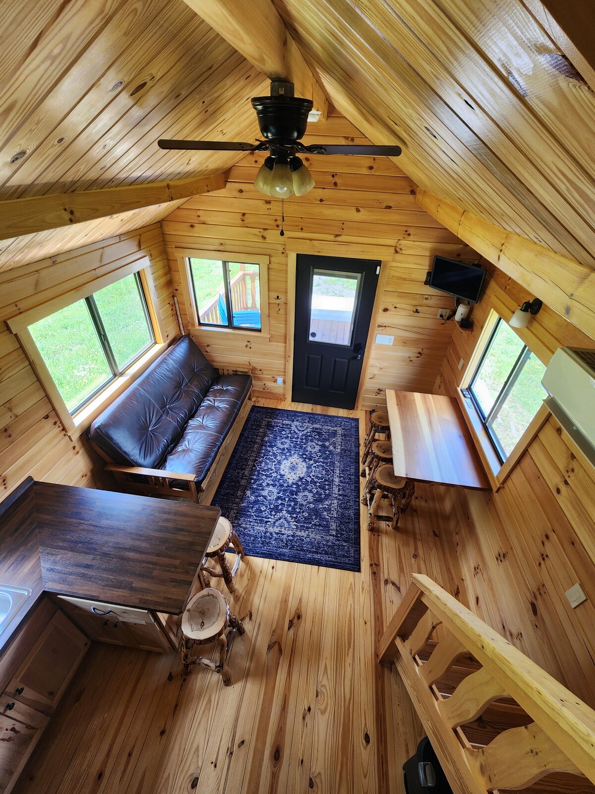 Looking down on the living area from the loft